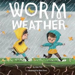 two children stomping in puddles